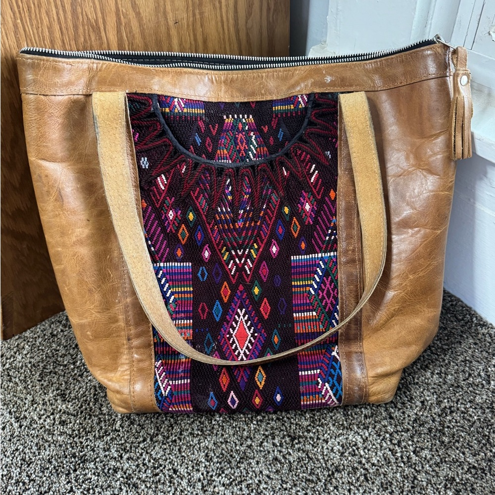 Fair Trade leather bag with had embroidery